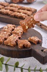 Jan Hagel Cookies (pronounced Yahn Hahgel, sometimes written as Janhagel) are delicious shortbread cookies spiced with cinnamon, topped with almonds and pearl sugar. 
