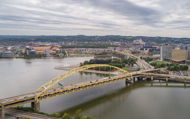 Fototapeta na wymiar Fort Pitt Bridge in Pittsburgh, Pennsylvania. Monongahela river and Cityscape in Background