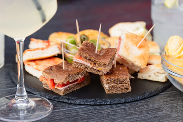 Various mini sandwiches for a pleasant aperitif (Selective focus)