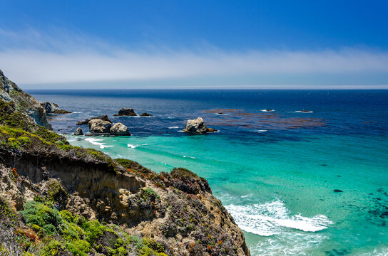 Beautiful rocky coastline and vegetation at the Pacific Ocean in California, United States
