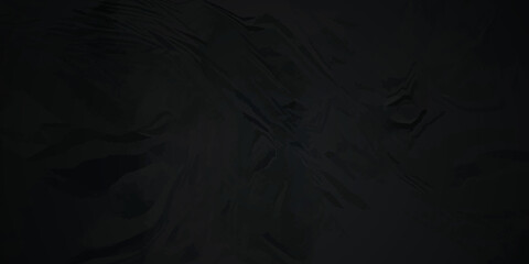 Black paper texture . Dark black wrinkled paper texture. Black crumpled paper texture . black crumpled and top view textures can be used for background of text or any contents .