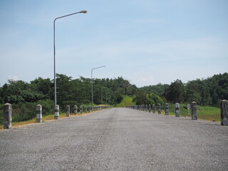 lamp post on road in the countryside