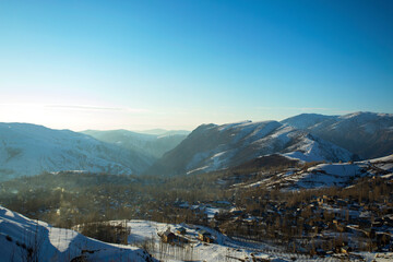 Sunset over the village in the mountains