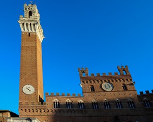 Obraz premium Town Hall called PALAZZO PUBBLICO and Tower in Siena In itay