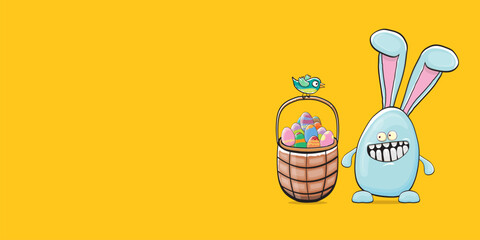 Cartoon funny cartoon blue easter bunny holding easter backet with full of colorful easter eggs isolated on orange horizontal banner background. Easter hand drawn blue cute rabbit sticker or label