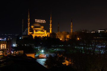 Sultan Ahmed Square and Blue Mosque at night time in Istanbul - Turkey. Ramadan Kareem.