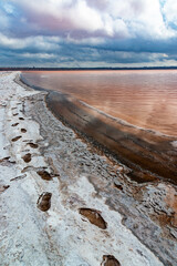 Kuyalnik estuary, Black Sea. Table salt in the form of round pancakes at the bottom and the bank of...
