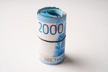 Russian money roll ruble on a white background