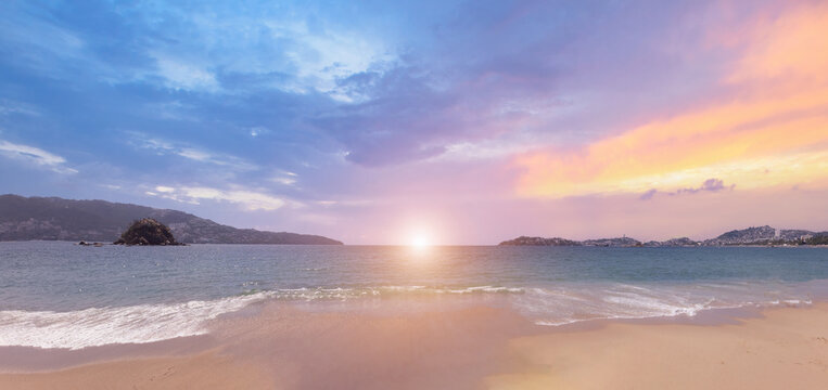 Mexico, Acapulco resort beaches and sunset ocean views near Zona Dorada Golden Beach zone.