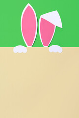 Easter background with rabbit ears on a light background. Easter card. Copy space.