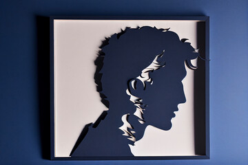 Silhouette of a man in a frame on a blue background. Father's Day. Generative AI