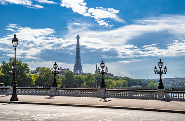 Fototapeta na wymiar Bridge Pont Alexandre III Over River Seine With View To Eiffel Tower In Paris, France