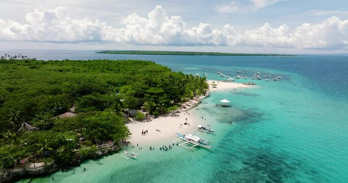 Beautiful sandy beach on a tropical island. Virgin Island, Philippines.