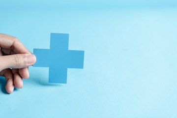 Health insurance concept. people hands holding plus and healthcare medical icon, health and access to welfare health concept.