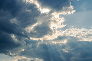 Blue sky with clouds and sun light