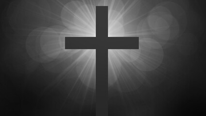 Jesus Christ risen. Cross surrounded by sun rays. Easter and resurrection concept. Black and white tones with bokeh