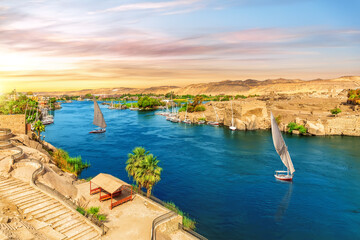 The Nile river and traditional feluccas in Aswan, Egypt, beautiful aerial view