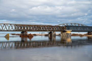 Fototapeta na wymiar Tczew, historical bridge on Wisla river in Pomeranian Voivodeship, Poland at winter