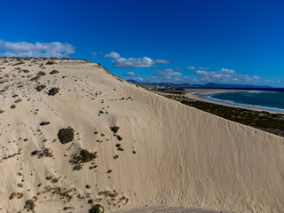 Aerial view on sandy dunes and turquoise water of Sotavento beach, Costa Calma, Fuerteventura,...