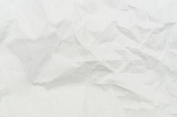 Obraz premium Wrinkled or crumpled white stencil paper or tissue after use in toilet or restroom with large copy space used for background texture in decorative art work