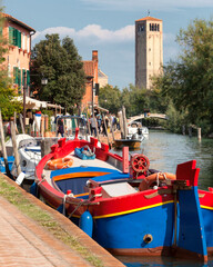 Naklejka premium Torcello, Venezia. Bragosso sul rio dell'isola verso la Torre di Santa Maria.