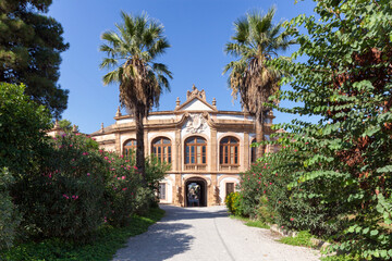 Fototapeta na wymiar Bagheria, Palermo. Viale di ingresso co palme di Villa Palagonia 