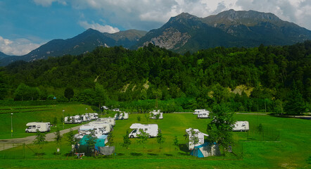 Fototapeta na wymiar caravan parking in mountains 