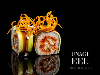 Close up to sushi roll pieces with mirror reflection on black background. Sushi roll with eel,...