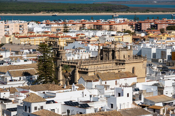Fototapeta na wymiar Air view of Sanlucar de Barrameda, where we can see some of its streets, houses and traditional buildings. Tourist village of the province of Cadiz. Autonomous Community of Andalucia. Spain.