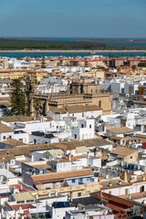 Fototapeta premium Air view of Sanlucar de Barrameda, where we can see some of its streets, houses and traditional buildings. Tourist village of the province of Cadiz. Autonomous Community of Andalucia. Spain.