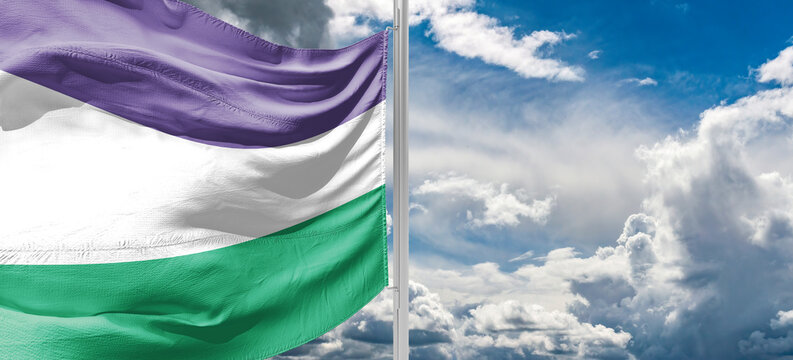 Women's Suffrage Flag In UK Colours Of The Suffragette Movement. Purple Represents Loyalty And Dignity, White For Purity, And Green For Hope