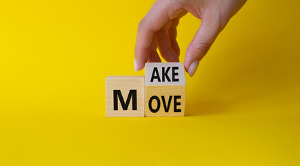 Make your Move symbol. Businessman hand Turnes cubes with words Make Move. Beautiful yellow background. Business and Make your Move concept. Copy space