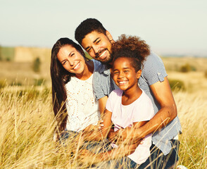 child daughter family happy mother father healthy carefree fun together girl cheerful field outdoor natur summer portrait