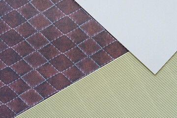 scrapbook paper with pattern, smooth paper corner, and corrugated texture