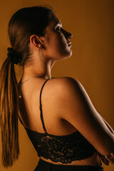 Naklejka premium Girl posing with closed eyes. Close up. Side view