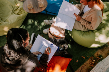 Two high school girls in a coffee bar