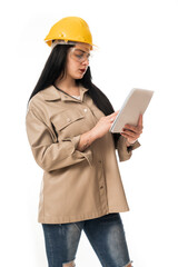young entrepreneur woman engineer at work with hammer and construction helmet on white background in studio, construction company