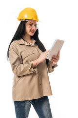 young entrepreneur woman engineer at work with hammer and construction helmet on white background in studio, construction company