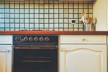 Vintage retro kitchen with green pattern tiles, american retro kitchen home interior design 70's...
