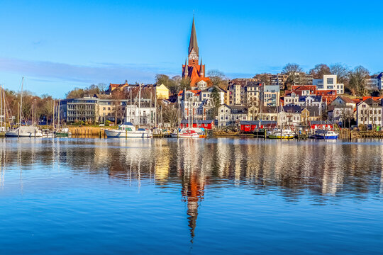 Flensburg, Germany - 03 March 2023: View of the historic harbour of Flensburg with some ships.