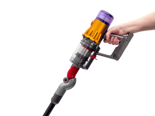 Woman's hand holds Modern cordless vacuum cleaner isolated on white background. New technologies.