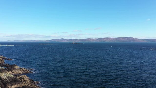 Aerial footage Roancarrigmore Lighthouse, Bantry Bay, West Cork, Ireland 4K
Shot by a drone which flies in orbit. Rocky coast and rough sea waves.