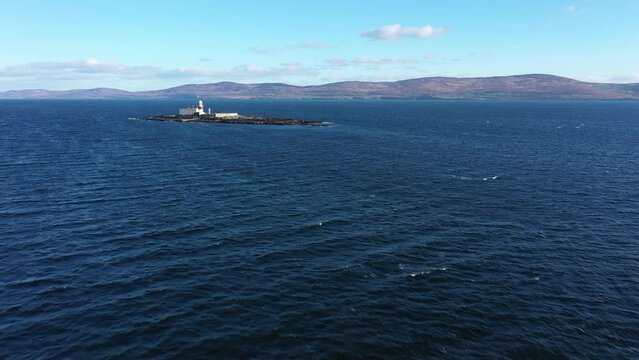 Aerial footage Roancarrigmore Lighthouse, Bantry Bay, West Cork, Ireland 4K
Shot by a drone moving forward.. Rocky coast and rough sea waves.