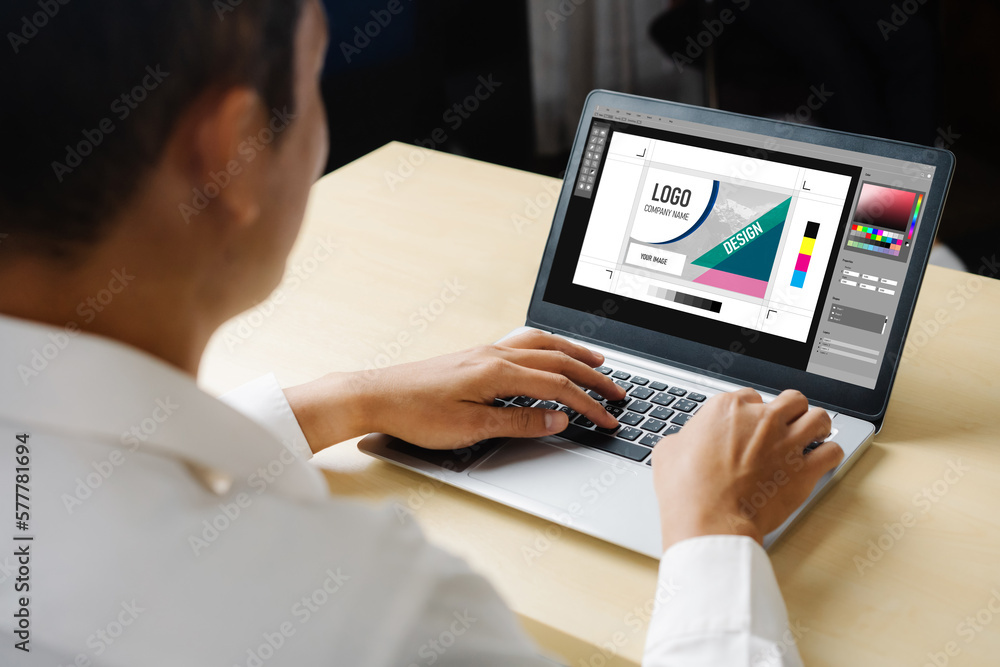 Poster graphic designer software for modern design of web page and commercial ads showing on the computer s