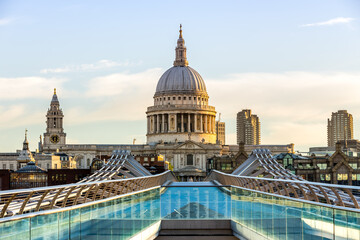 Fototapeta na wymiar St Paul's Cathedral and Millennium Bridge in London