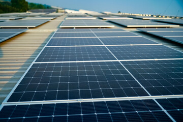 Technology solar power plant to innovation of green energy for life on factory roof.