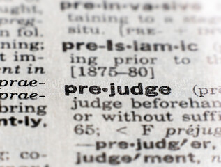 closeup of the word prejudge - obrazy, fototapety, plakaty