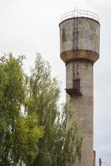 Brick water tower in clear sunny summer day