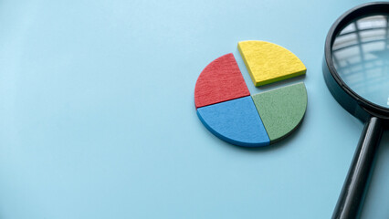 Quarterly report concept.Company financial report.Business charts. Colorful quarter wooden pie...