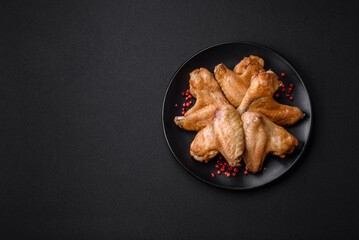 Baked chicken wings with salt, spices and herbs